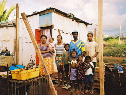 Exiled from Paradise, family and hut